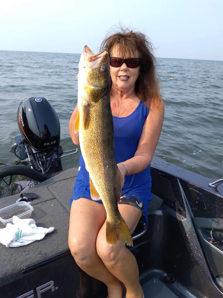 Lone angler enjoying the picturesque scenery in Kaukauna