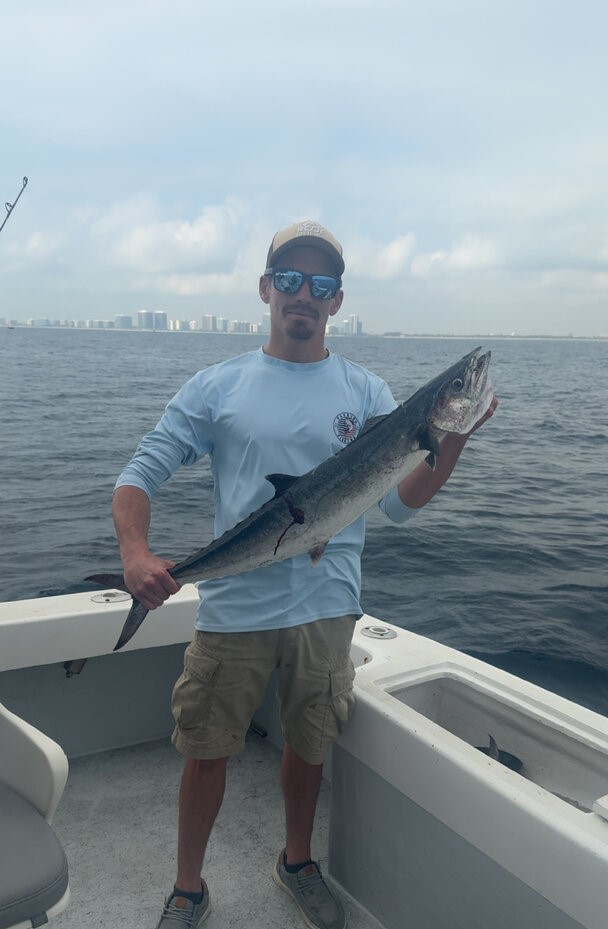 King mackerel catch displayed on fishing boat in Miami Beach FL waters