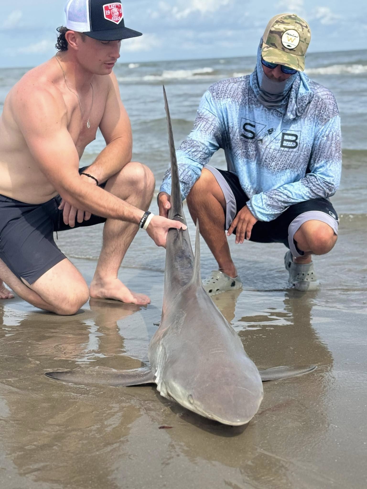 Two people fishing in TX