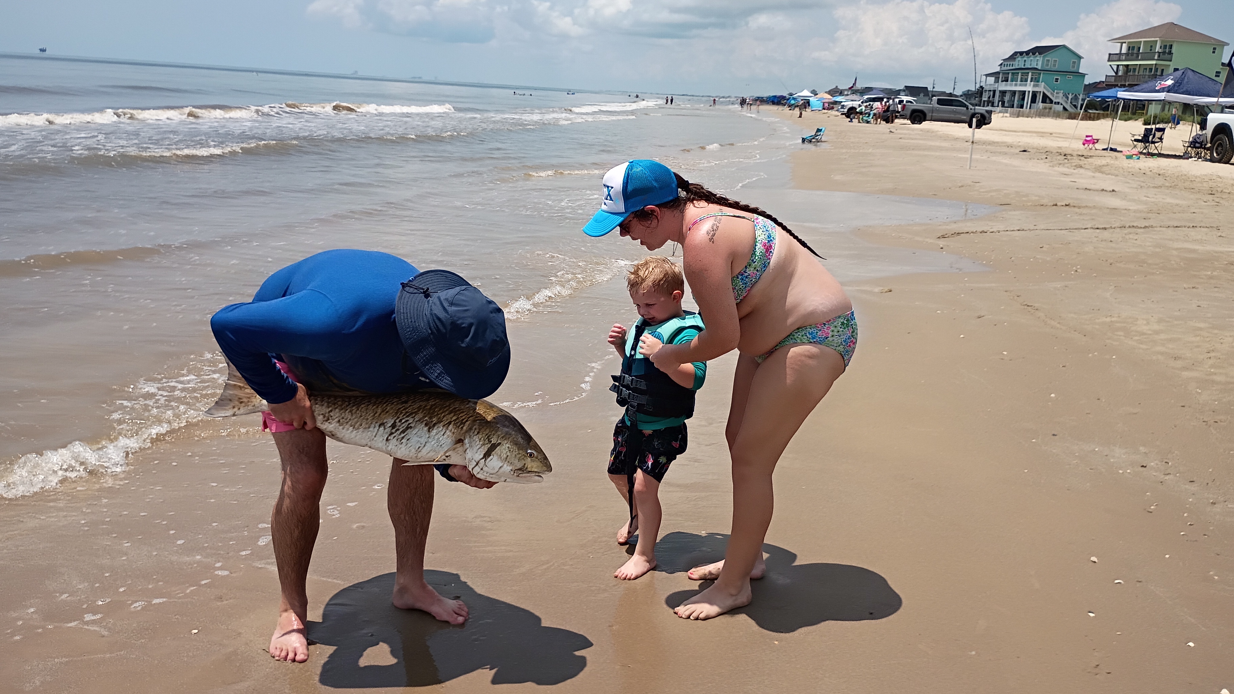 Captain Jeffrey Millet guiding surf fishing on Freeport Texas beach targeting redfish and sharks