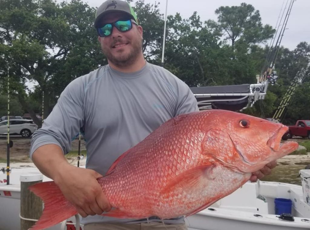 One person fishing in Orange Beach