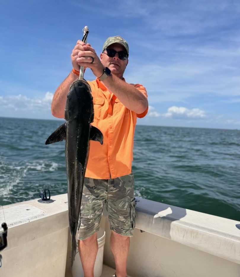 Large cobia fish catch held up on fishing charter boat in Norfolk VA waters