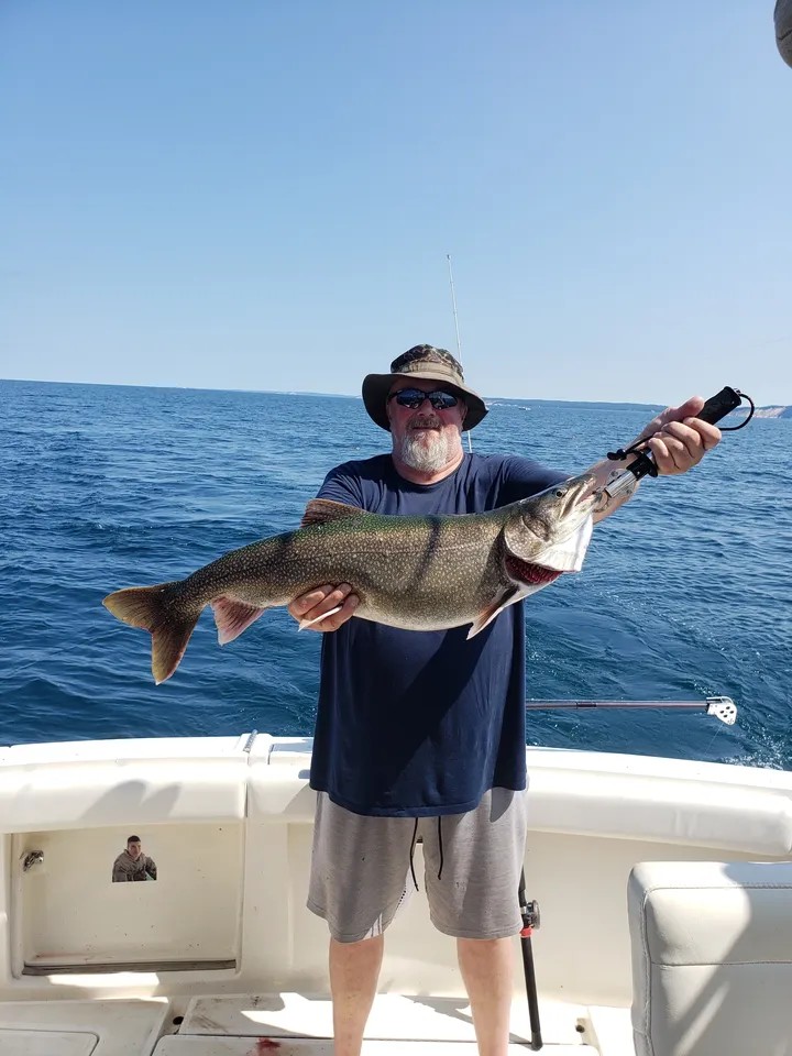 Lake trout catch displayed on fishing boat in Manistee MI waters