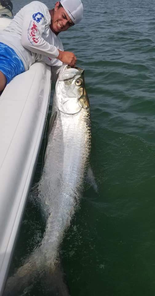 A person holding a 32-inch fish in Goodland