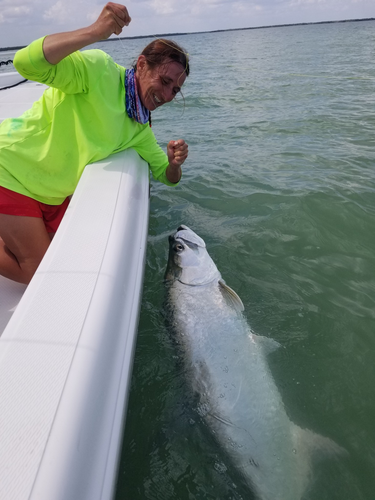 Angler holding a 28-inch fish in FL