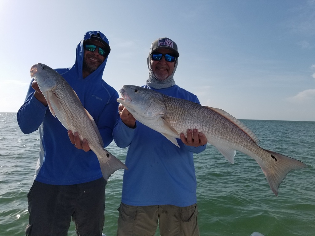 Two redfish, 32 inches long, caught in FL