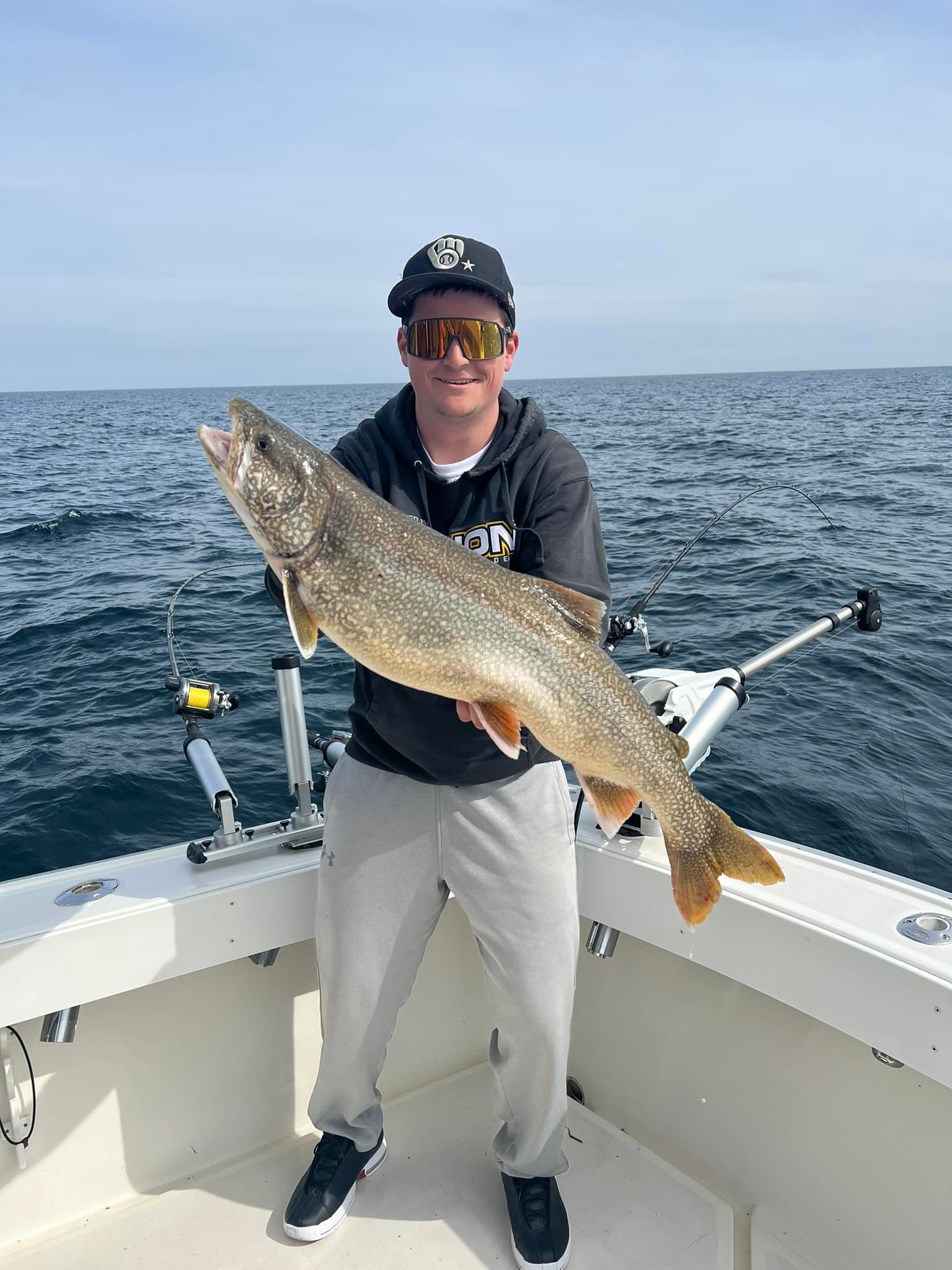 Angler posing with a 25-inch fish in Sturgeon Bay
