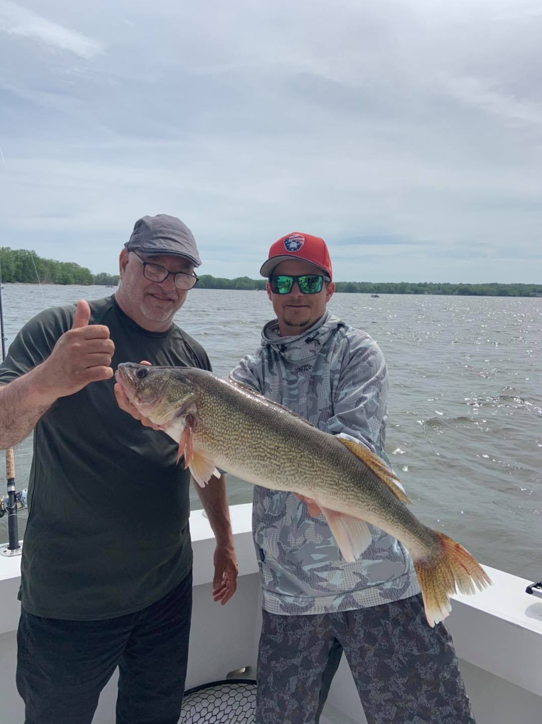 Walleye fish caught by two people in Sturgeon Bay