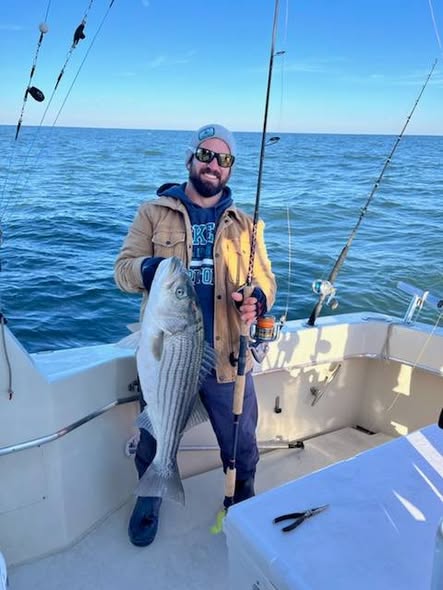 Striped bass catch displayed on fishing boat in Cape May NJ waters