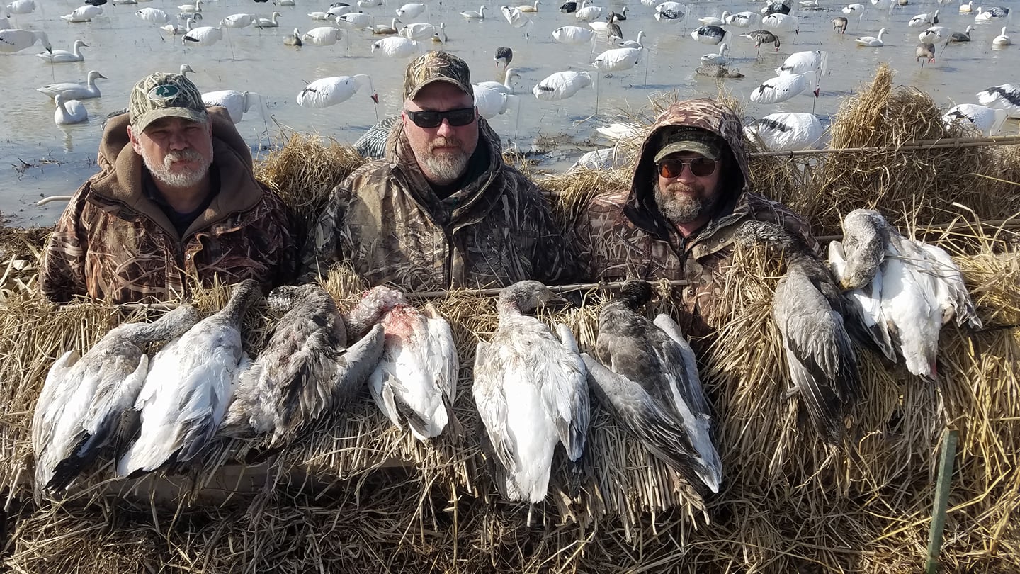 Three people hunting in Sebewaing