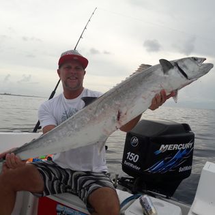 A person fishing at Lake Worth