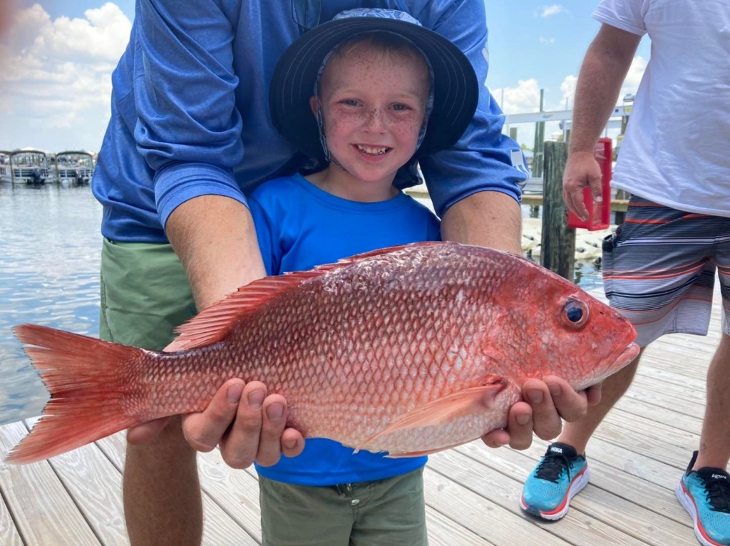 A single person enjoying fishing at Orange Beach