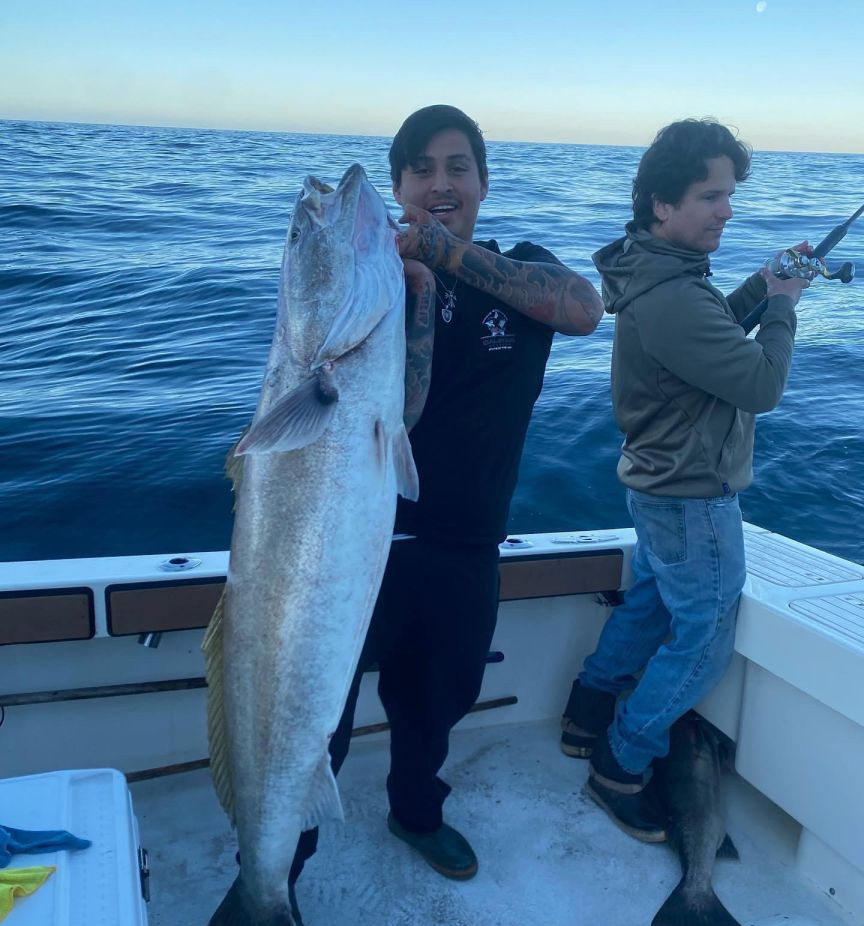 Two anglers fishing at Huntington Beach