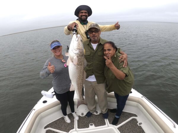 4 people enjoying a great day fishing in LA