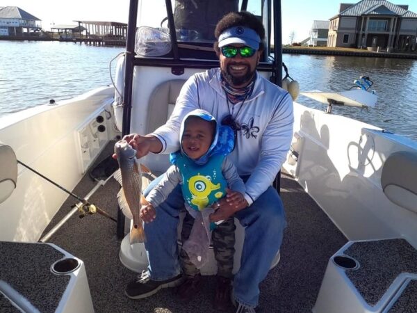 Two anglers with a freshwater fish in Port Sulphur