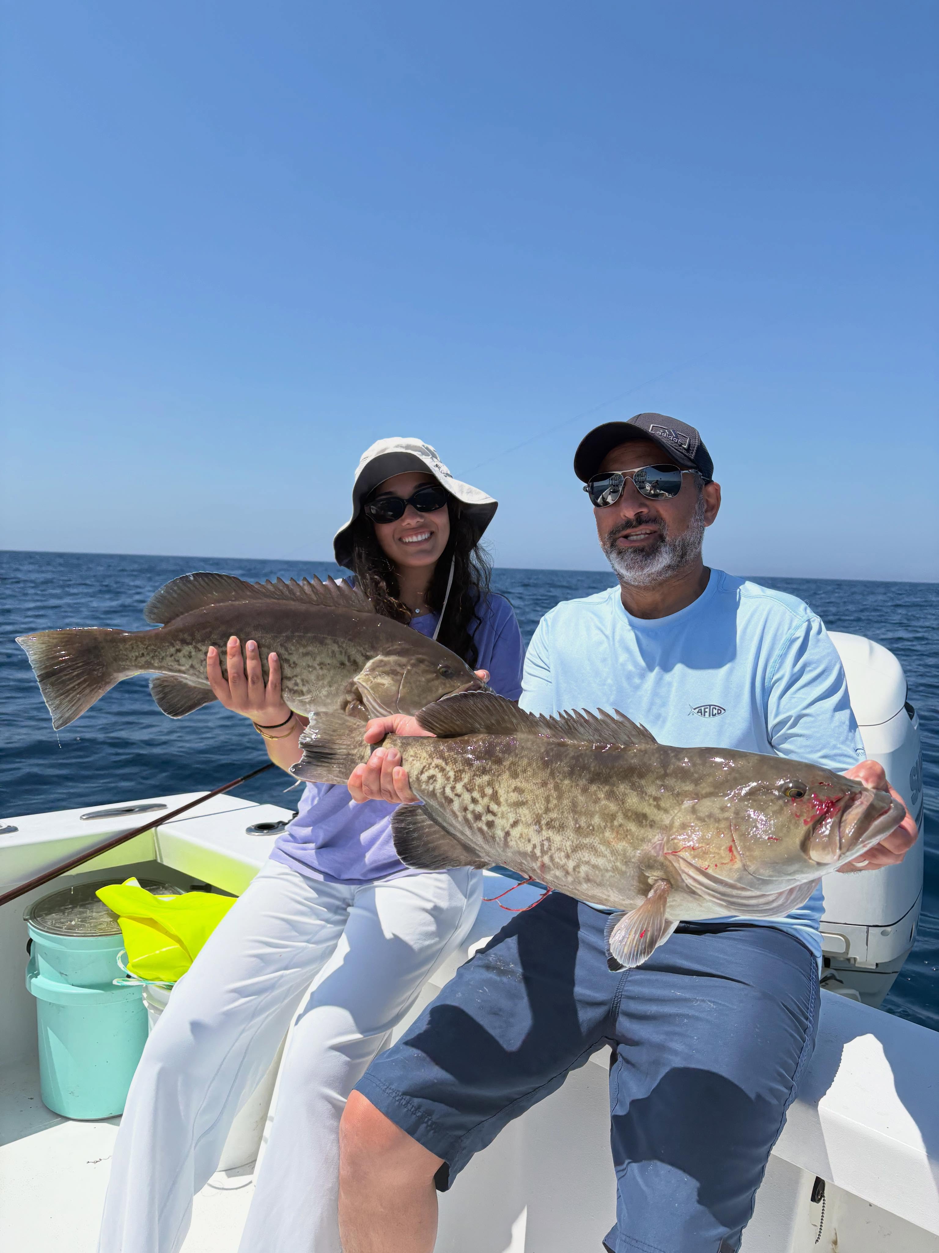 Two gag grouper caught fishing in Morehead City NC on boat deck