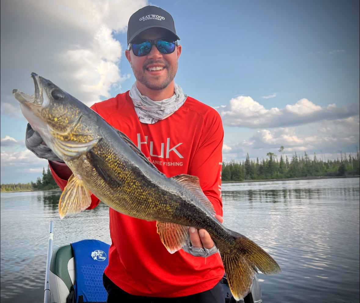 Angler with a 24-inch fish caught in Ontario