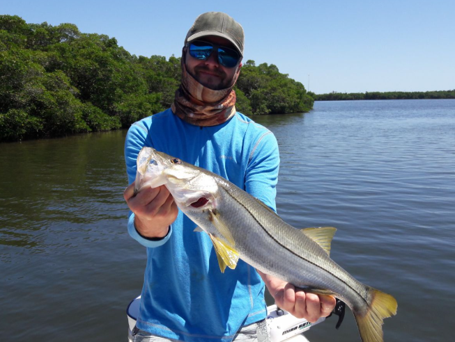 One angler reeling in a big fish in St. Petersburg