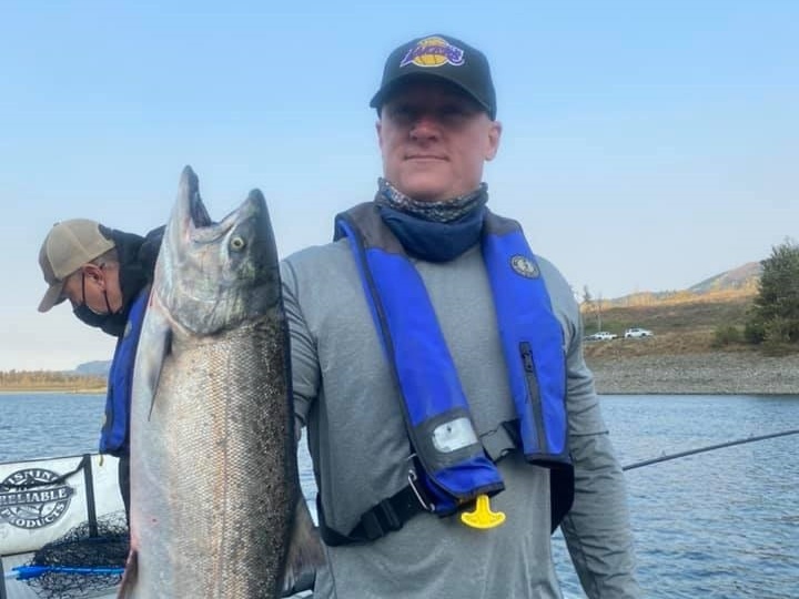 Anglers with a 43-inch rainbow trout in Portland