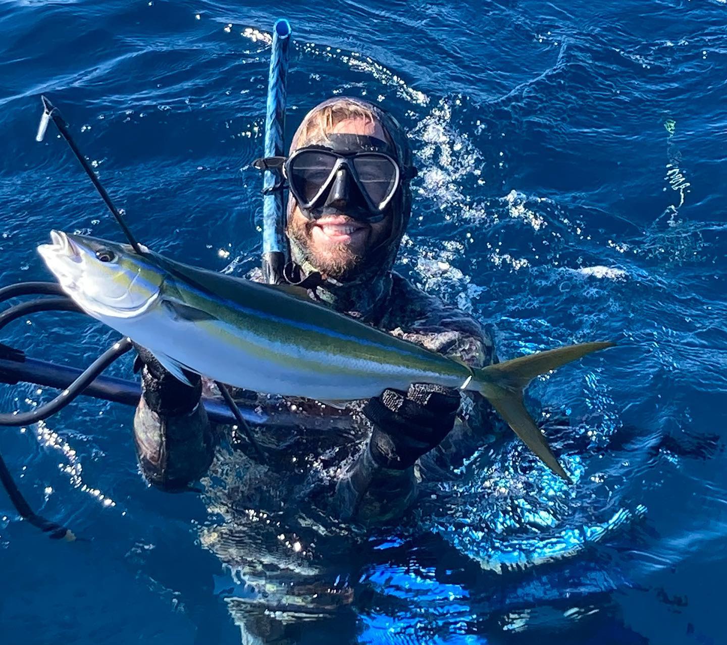 Photograph of a large rainbow runner fish caught while fishing in Wanchese