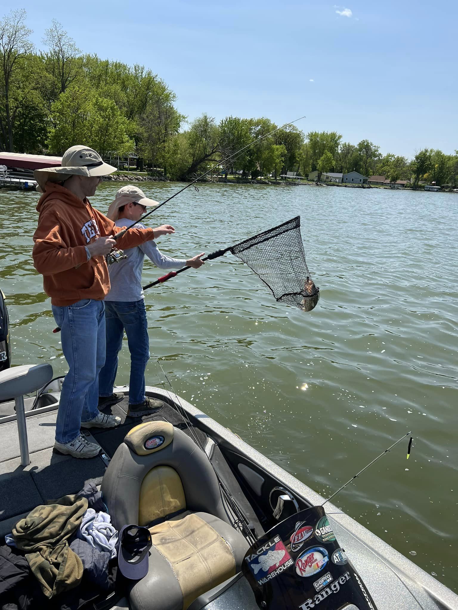 Two people fishing at Fox Lake