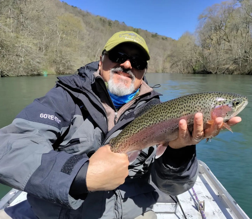 Fishing for a beautiful rainbow trout on the Little Red River