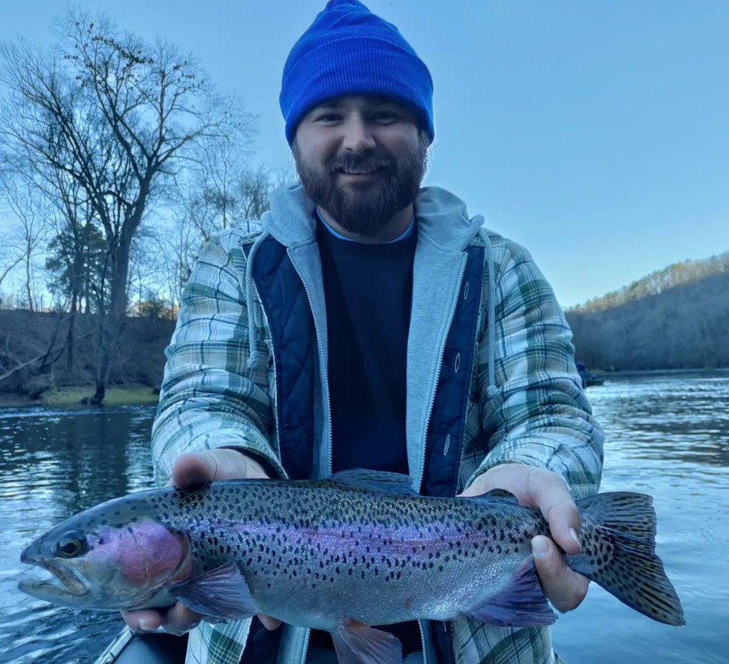 A rainbow trout, 18 inches long, caught in the Little Red River