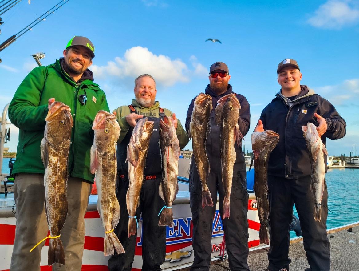 Successful lingcod fishing trip in Roseburg OR with fresh catch displayed