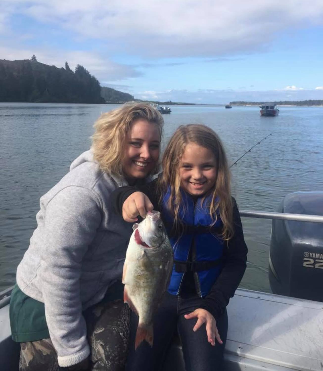 Successful fishing trip in Roseburg Oregon with fresh caught fish on boat