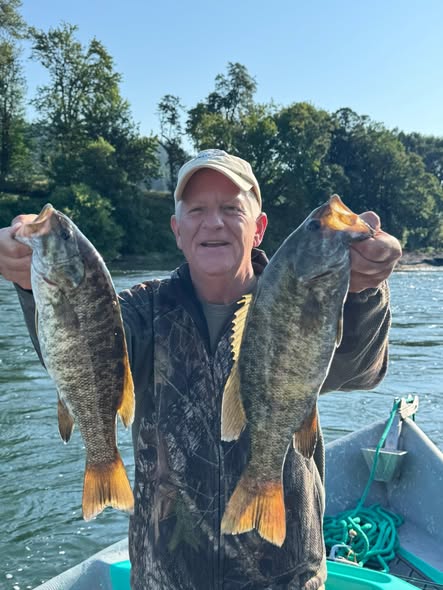 Two smallmouth bass caught during fishing tour in Roseburg Oregon