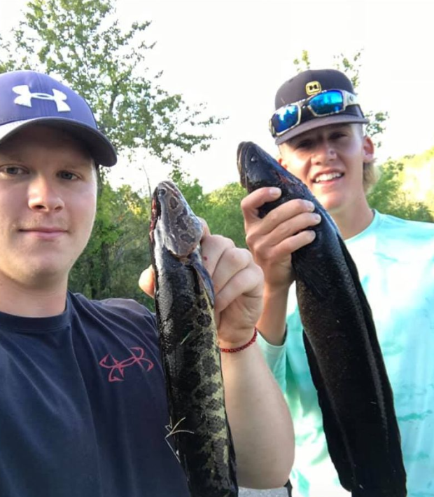 A couple fishing in Maryland with 1 fish