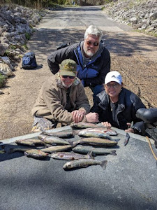 Three people fishing in Arkansas