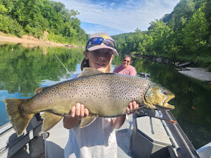A single rainbow trout caught while fishing in Eureka Springs