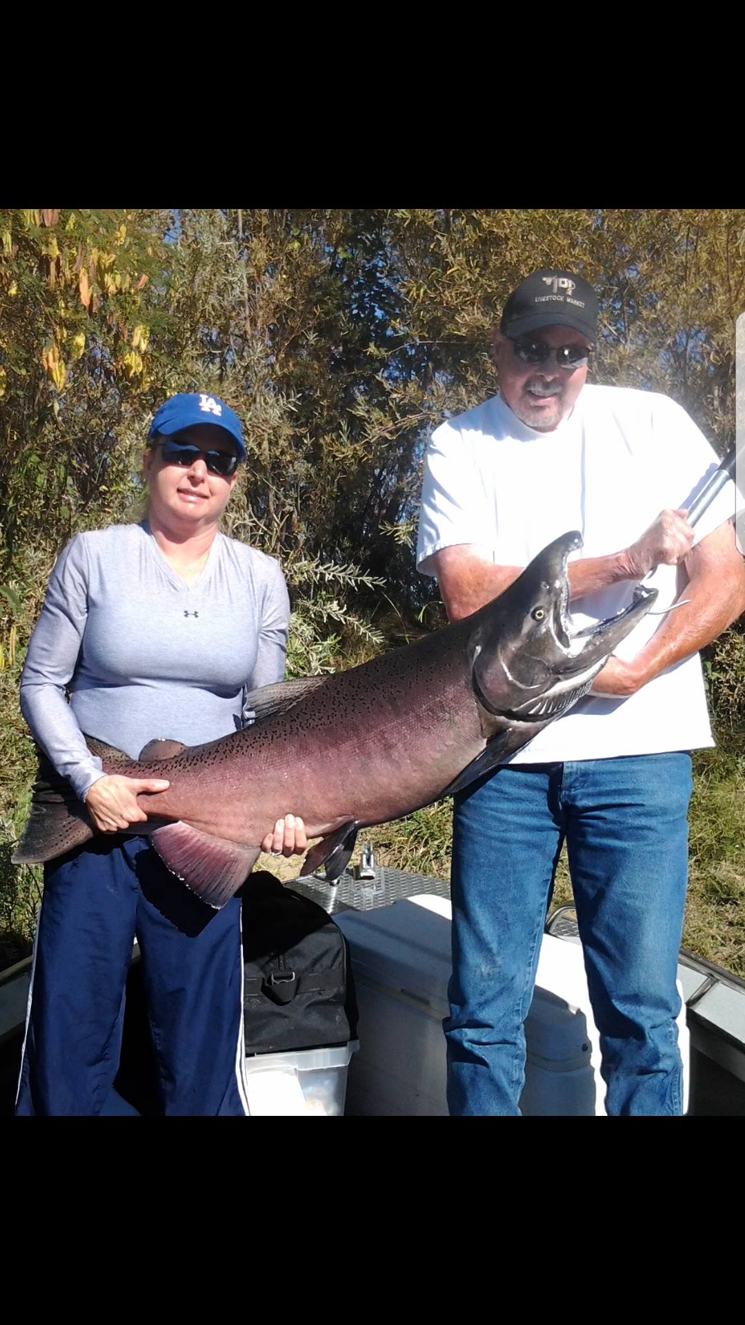 Two people fishing at Red Bluff
