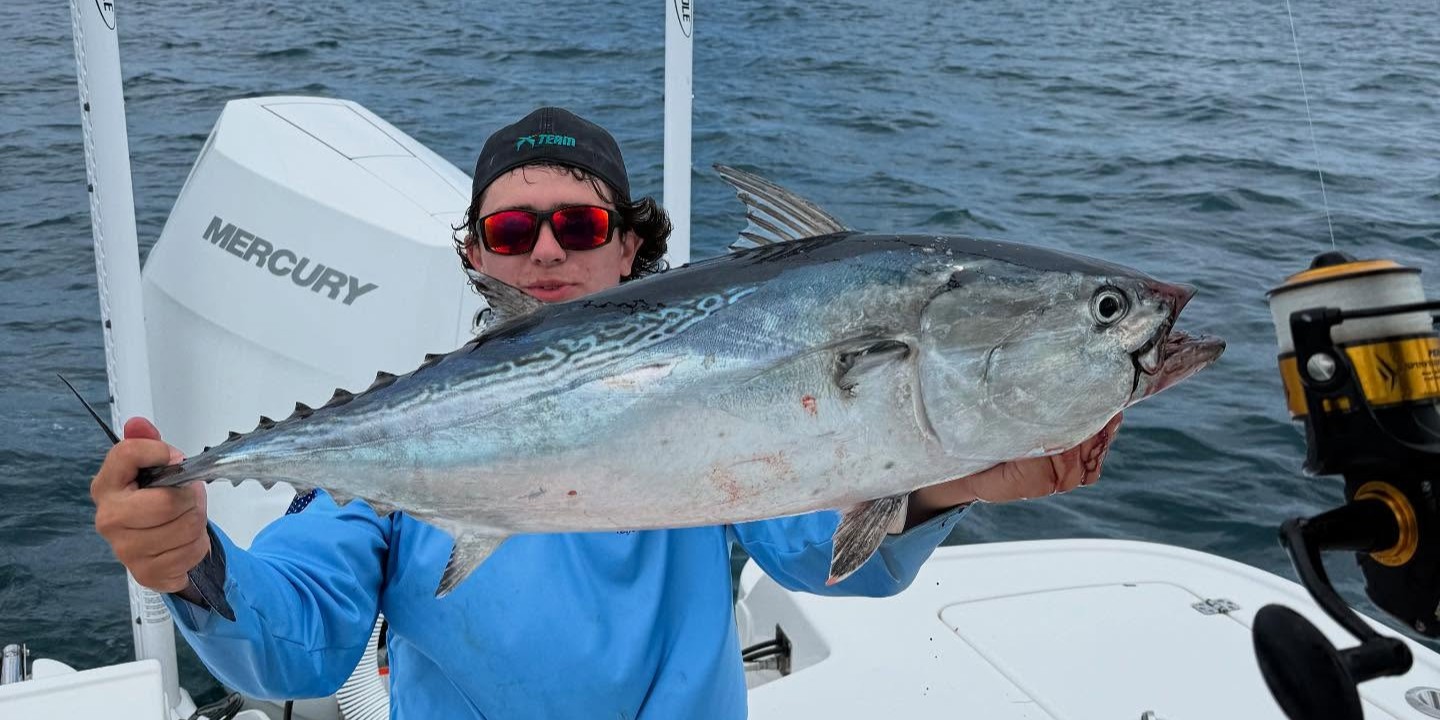 Big Pine Key offshore fishing charter boat on Florida Keys waters with fishing gear ready