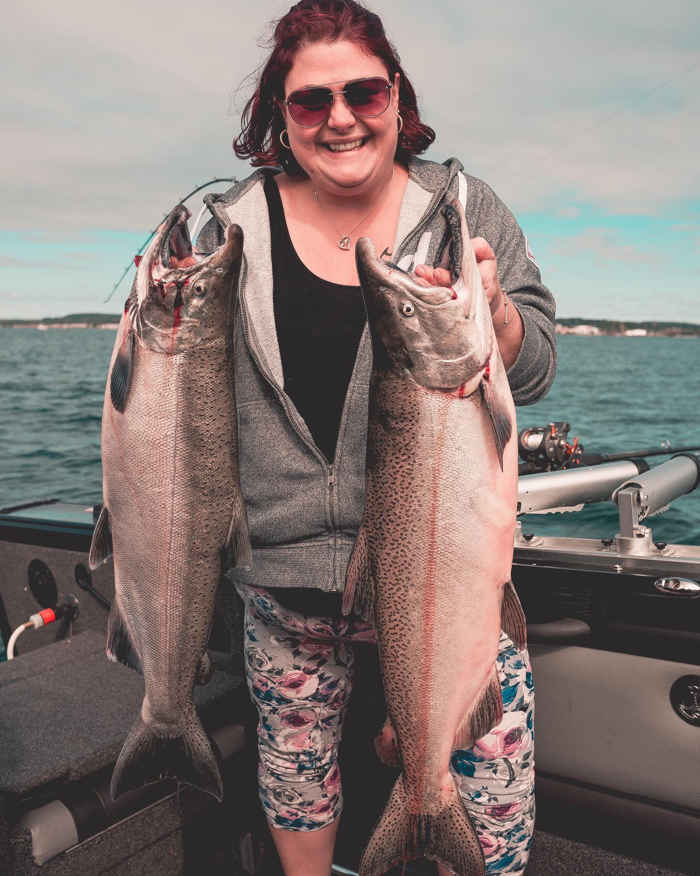 Coho salmon fishing on the water