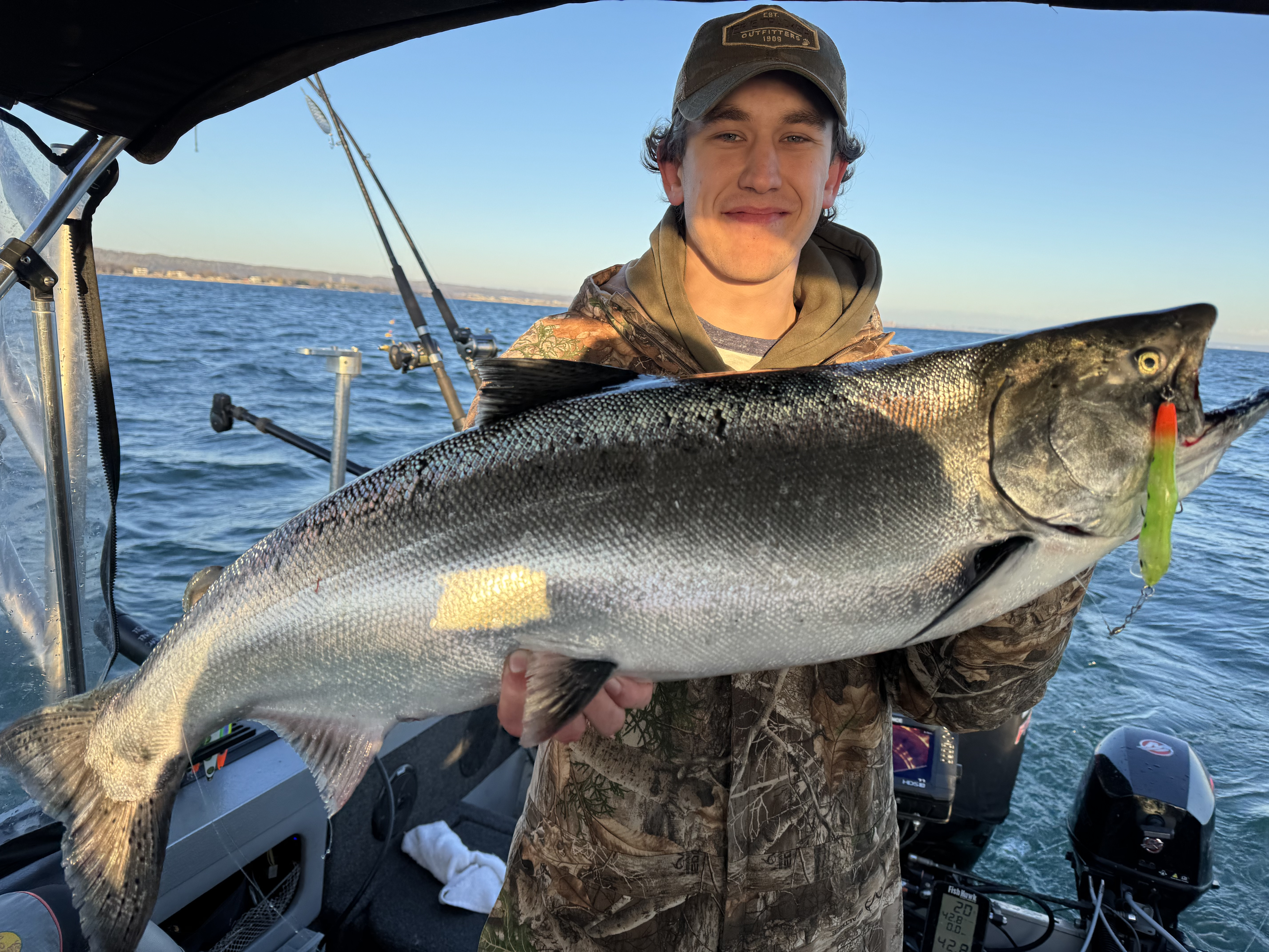 Large Chinook salmon caught fishing in Dunnville ON displayed on boat