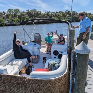 Two people enjoying a fishing tour in Sarasota