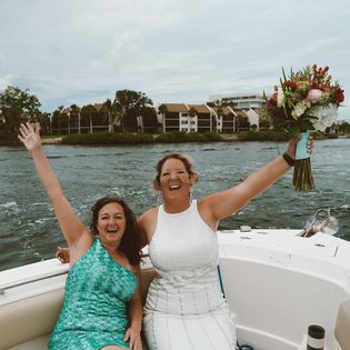 Two people enjoying a fishing tour in Sarasota