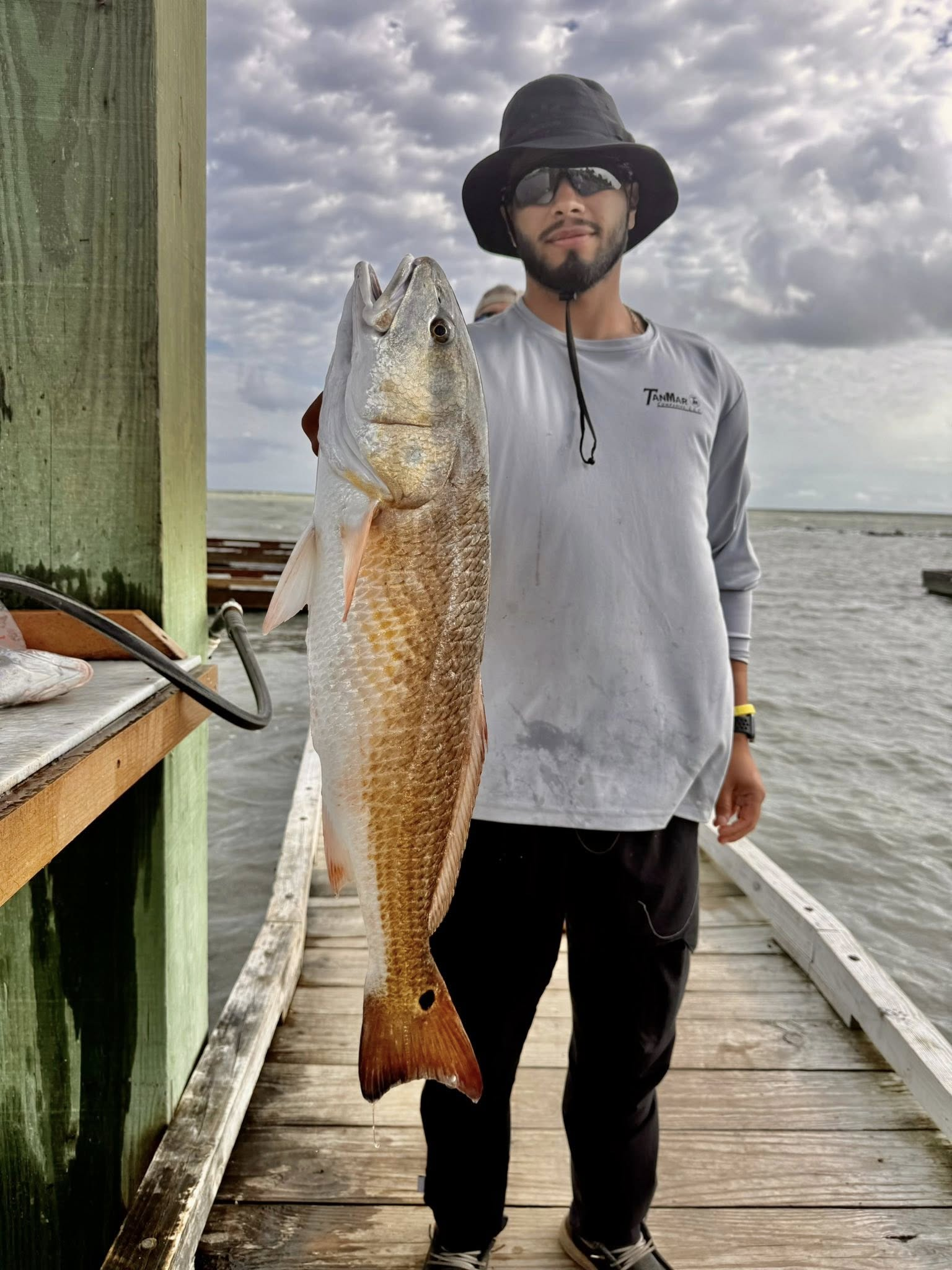 Redfish caught in Riviera Texas displayed on wooden dock