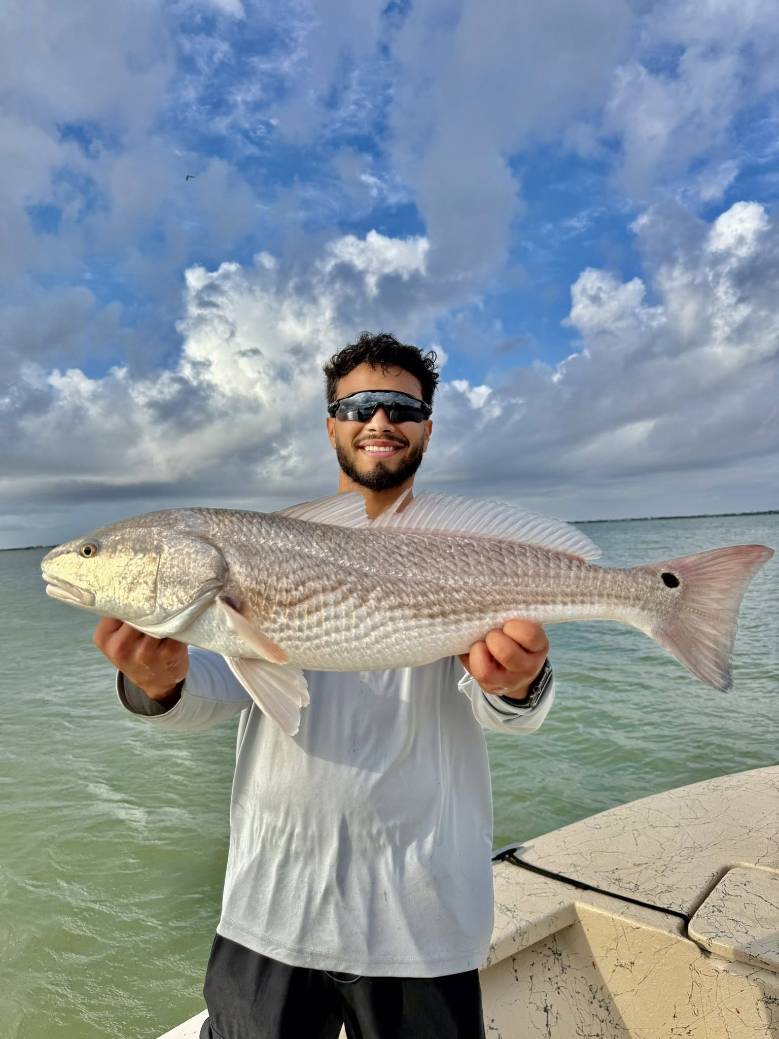 Redfish catch displayed at Riviera Texas fishing location