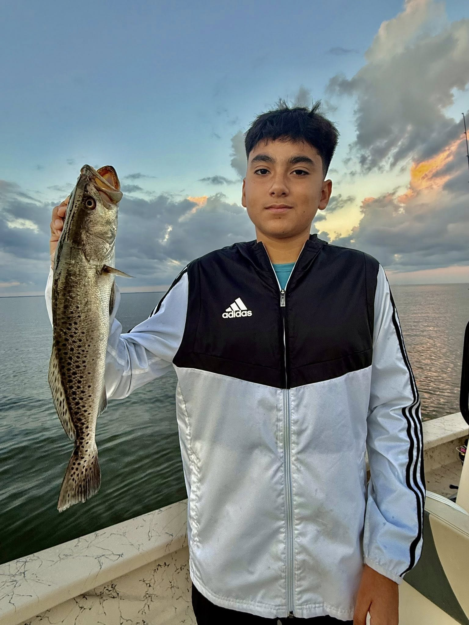Speckled trout catch displayed outdoors in Riviera Texas