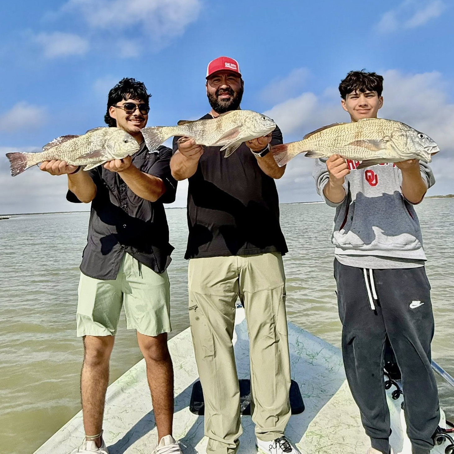 Baffin Bay fishing charter boat with anglers catching trophy trout and redfish inshore
