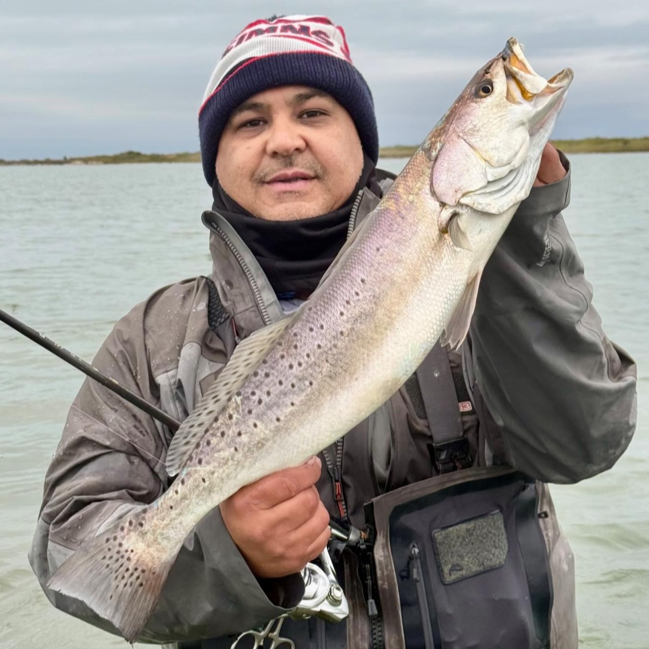 Baffin Bay fishing charter boat with anglers catching trout and redfish in South Texas waters