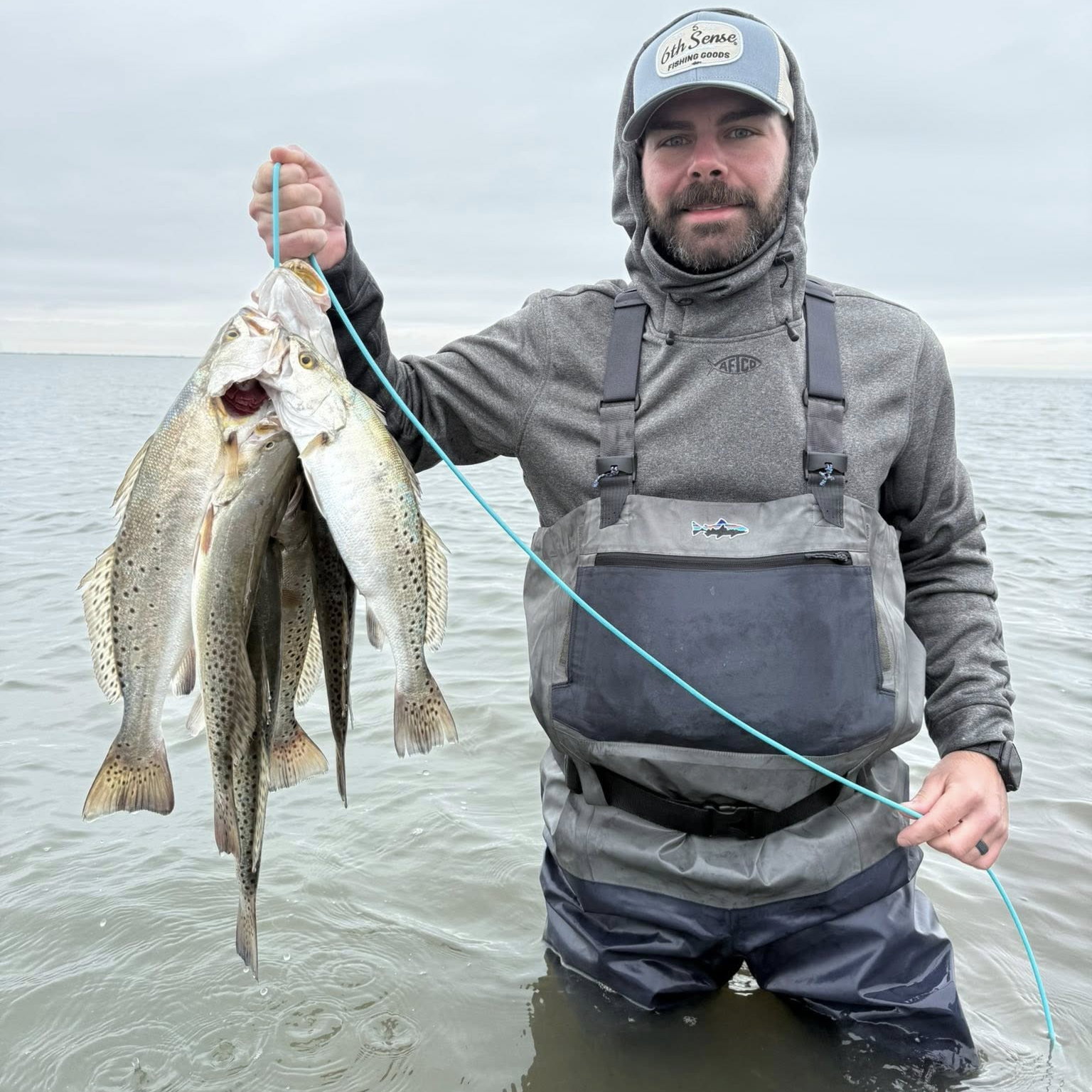 Baffin Bay fly fishing charter boat with anglers targeting trout and redfish in Texas waters