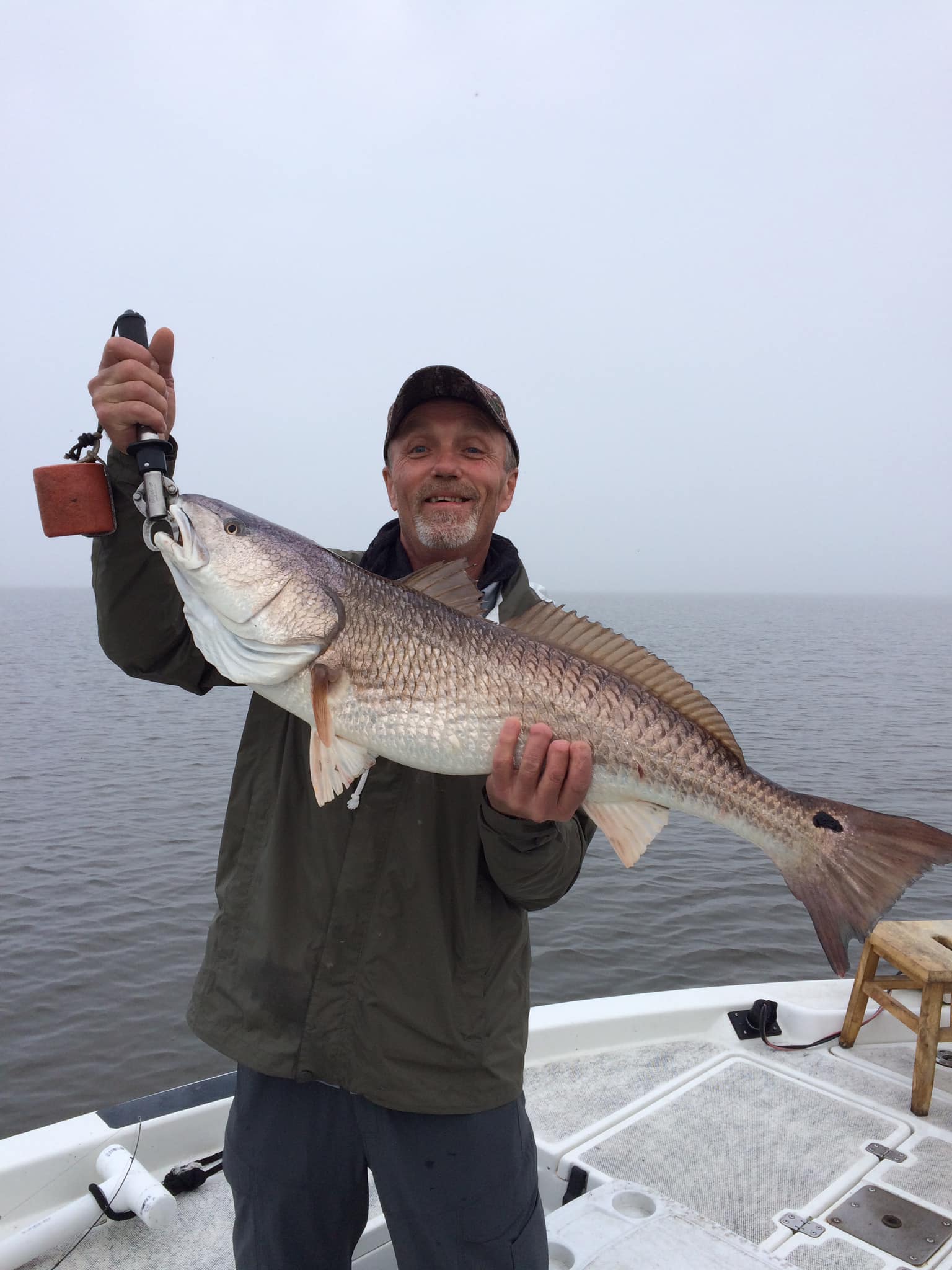 Photograph of one Redfish, measuring 28 inches, caught through fishing in LA