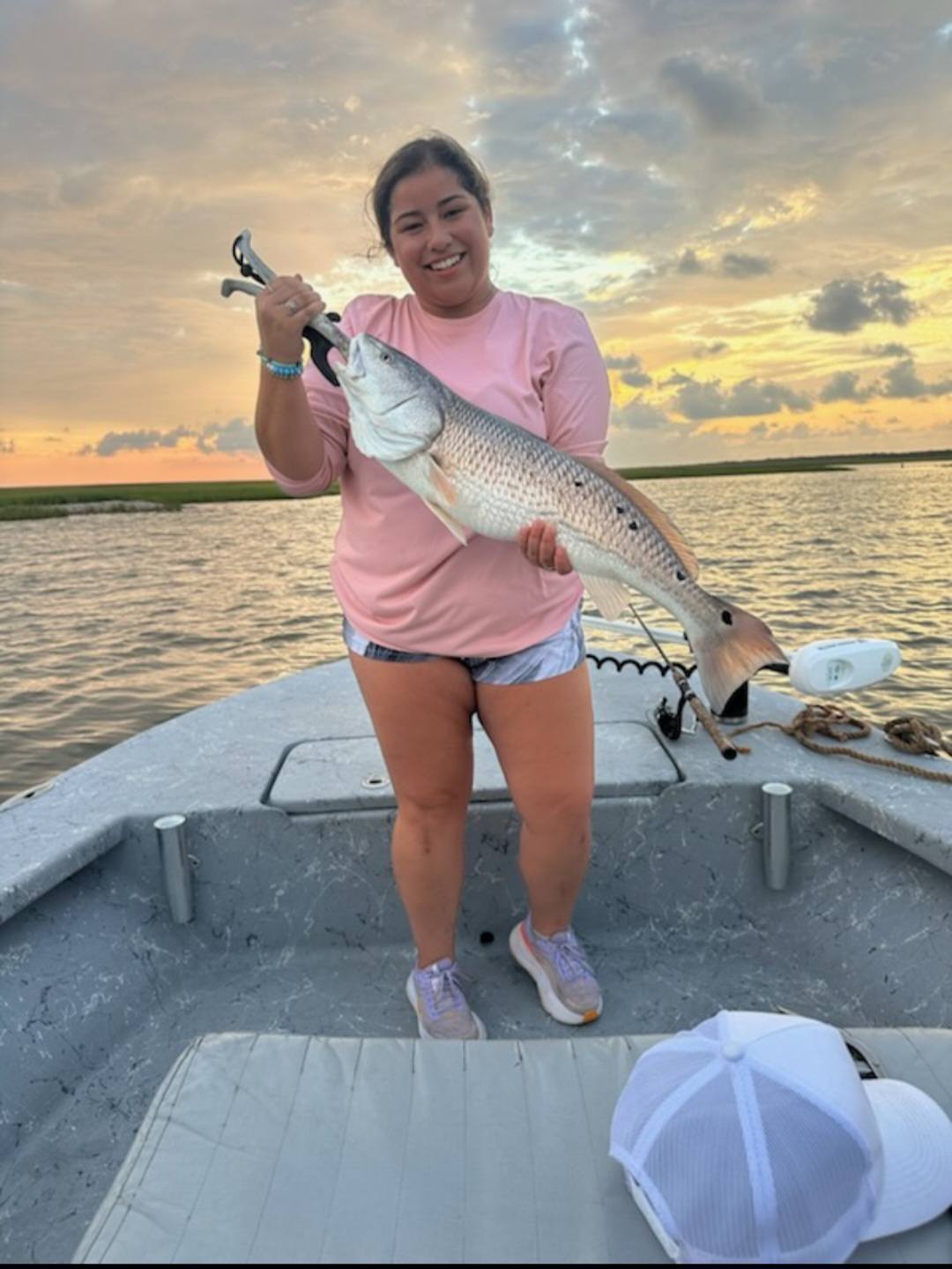 Galveston Bay inshore fishing charter boat targeting redfish and trout in shallow waters