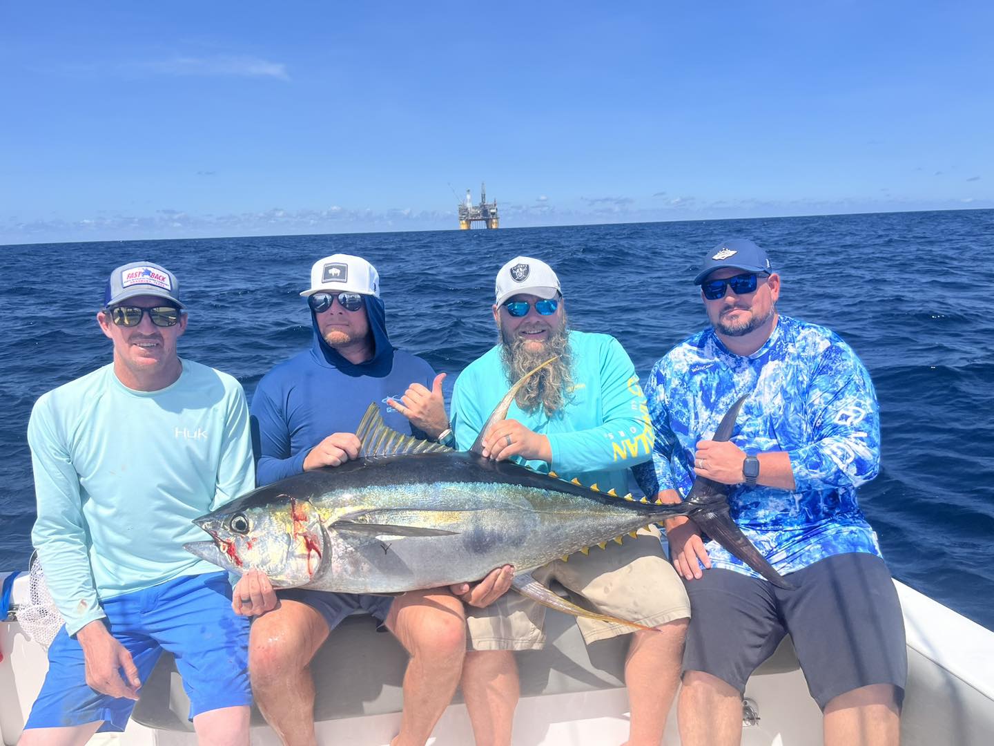 A yellowfin tuna, a large fish caught by a group of 4 people fishing in LA