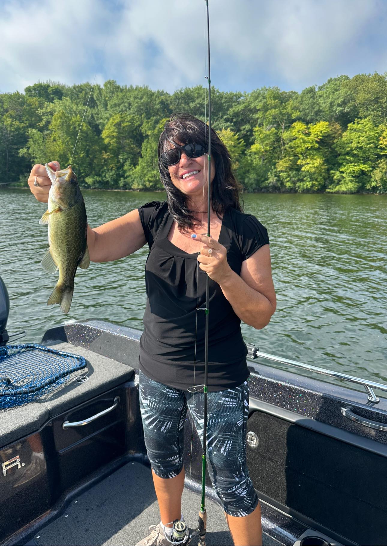 A largemouth bass fish caught during a fishing trip in Mound