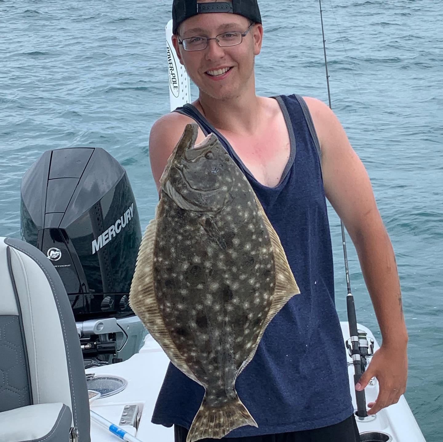 Southern flounder catch from Carolina Beach NC fishing trip on boat
